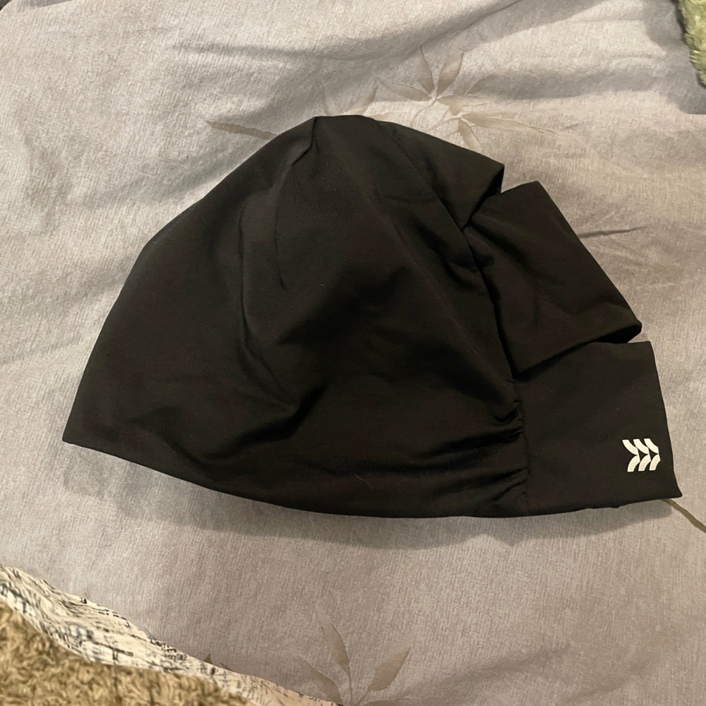 Black All in Motion Running Hat with High and Low Ponytail Openings